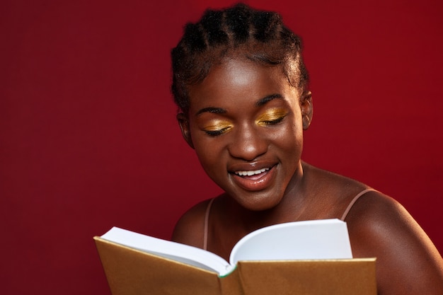 Front view smiley woman reading book