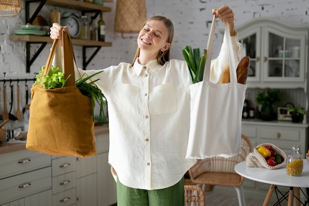 Free Photo front view smiley woman with bags