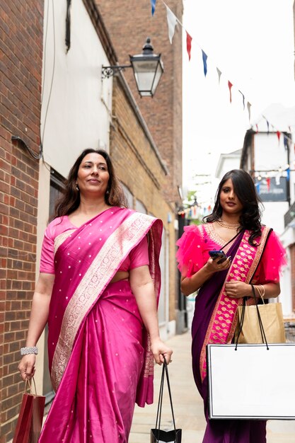 Front view smiley women walking together