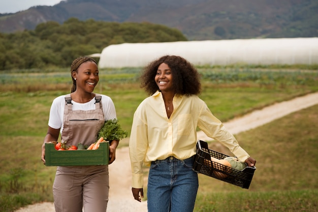 Front view smiley women with harvest