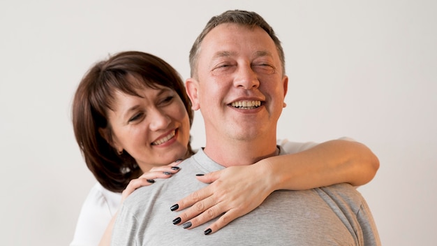 Front view of smiling man and woman