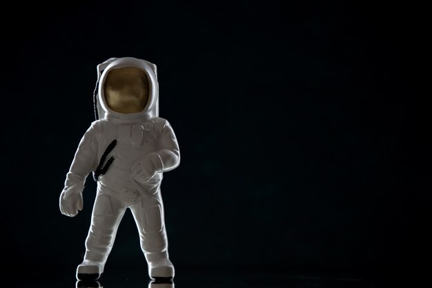 Front view of spaceman toy on the black