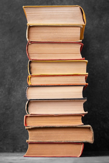 Front view of stack of different books