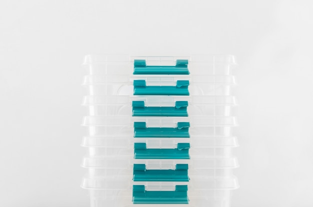 Free photo front view of stacked plastic food containers