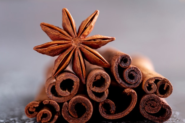 Free Photo front view of star anise and cinnamon sticks