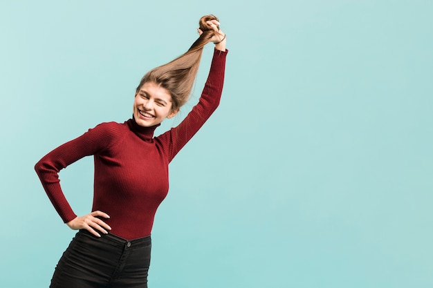 Free Photo front view strong woman in studio