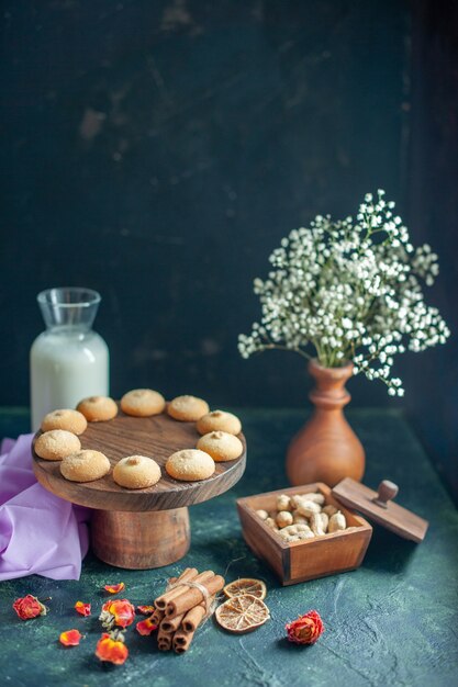 Front view sweet yummy biscuits on dark blue surface