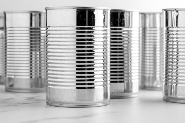 Front view tall tin cans