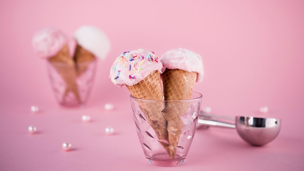 Free photo front view tasty ice cream cones on the table