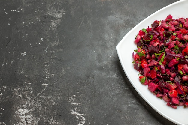 Front view tasty vinaigrette salad with beets and beans on grey background