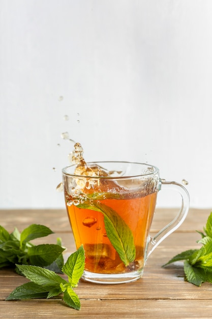 Free photo front view of tea herbal concept with copy space