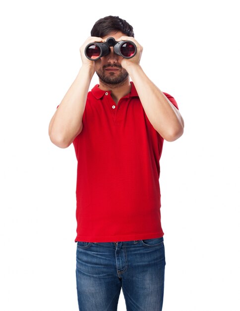 Front view of teen holding his binoculars