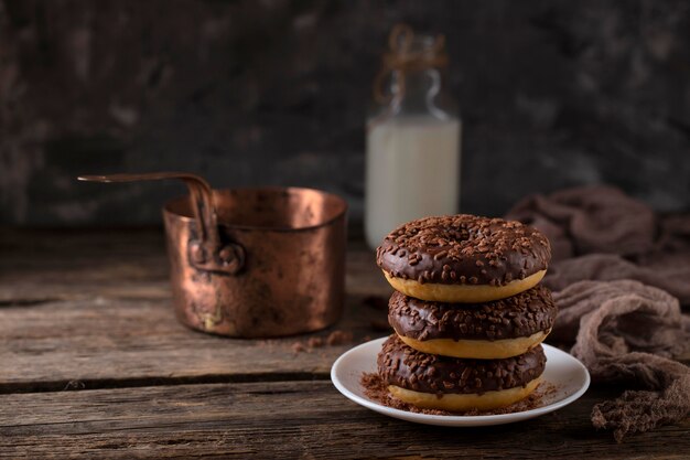 Front view tower composition with chocolate doughnuts