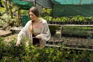 Free photo front view woman carrying basket