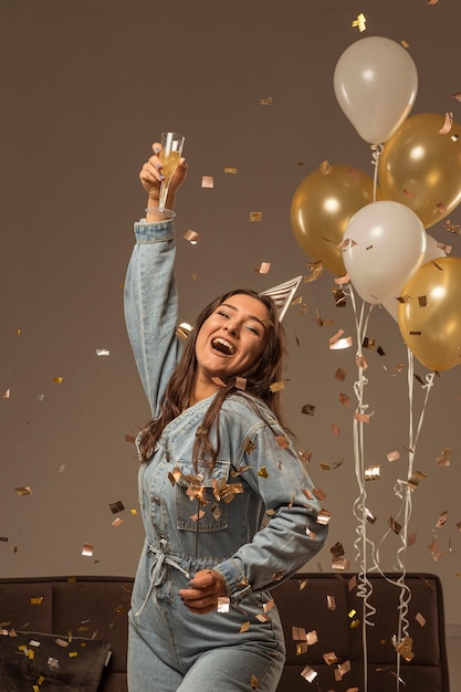 Front view of woman celebrating new year