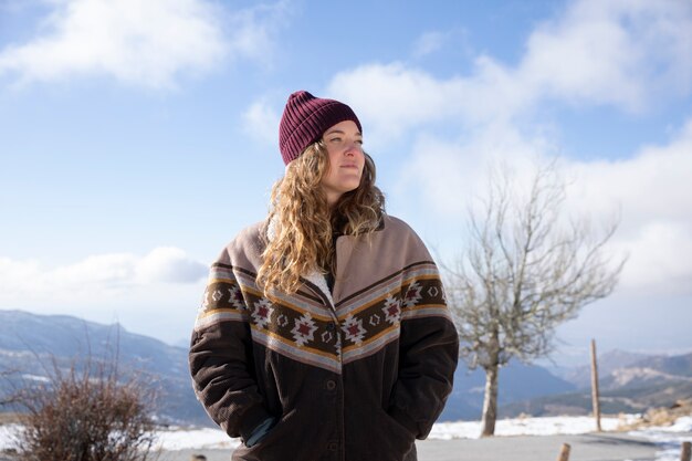 Front view of woman enjoying her winter trip