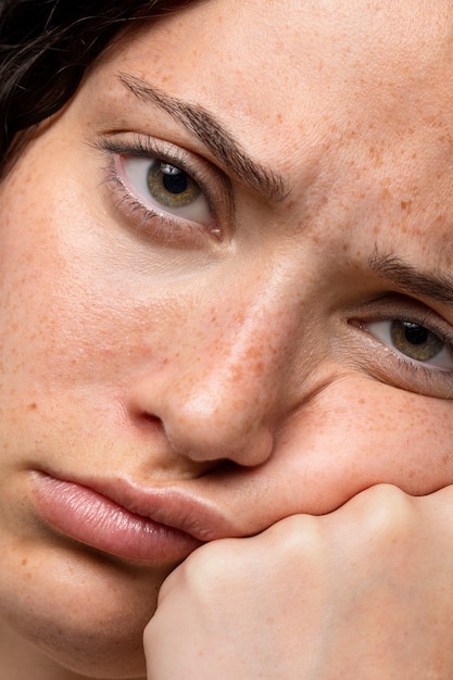 Free photo front view woman expressing sadness