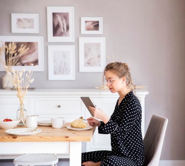 Front view of woman having breakfast