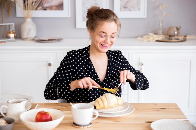 Front view of woman having breakfast