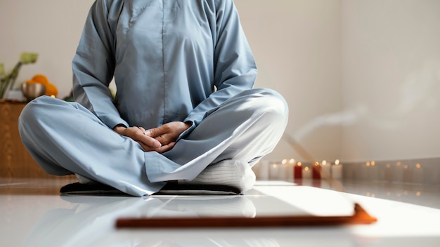 Free Photo front view of woman meditating