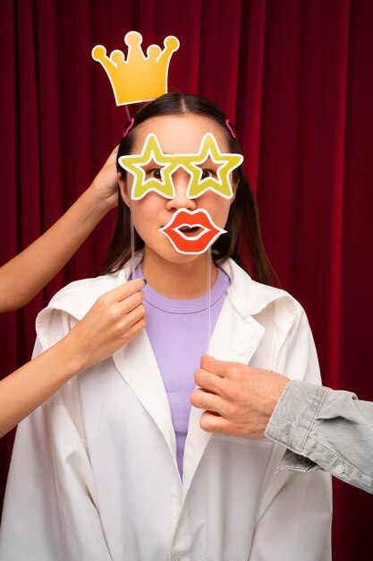 Front view woman posing in photo booth