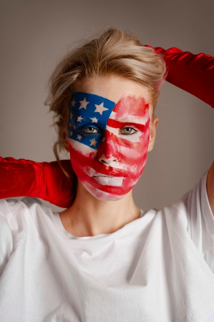 Front view woman posing with usa makeup