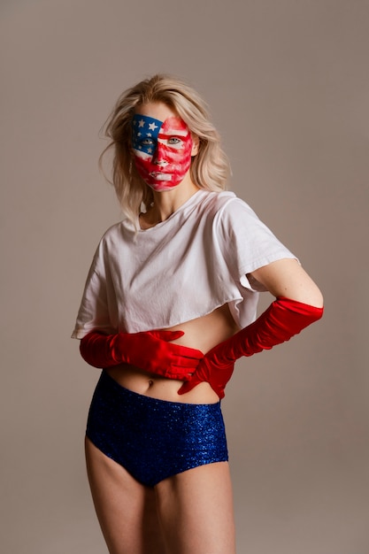 Front view woman posing with usa makeup