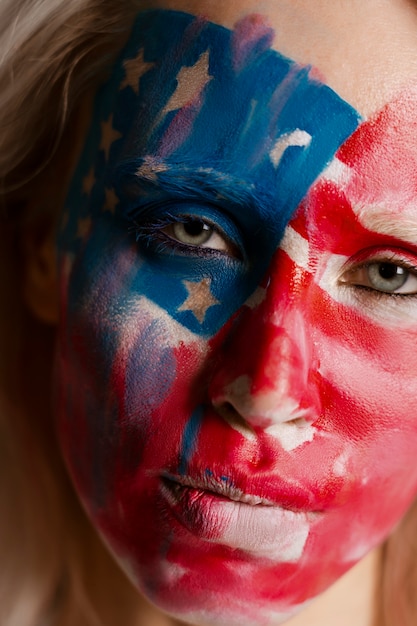 Free photo front view woman posing with usa makeup