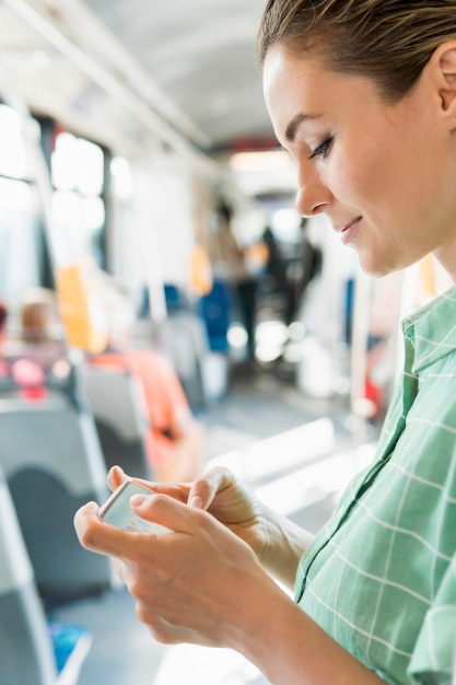 Free Photo front view of woman in public transportation