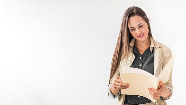 Front view woman reading notes with copy space