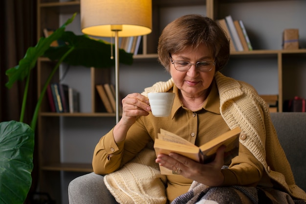 Free Photo front view woman sitting at home