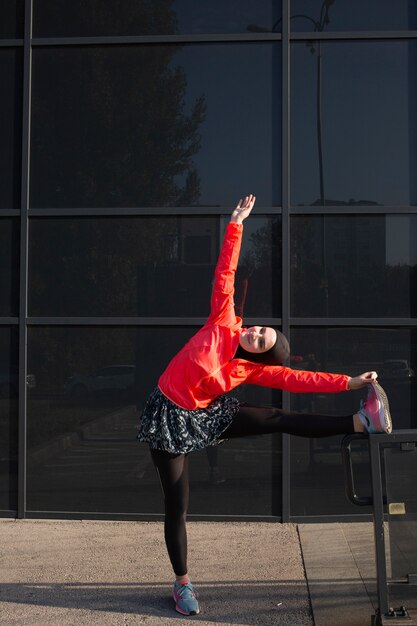 Front view of woman stretching