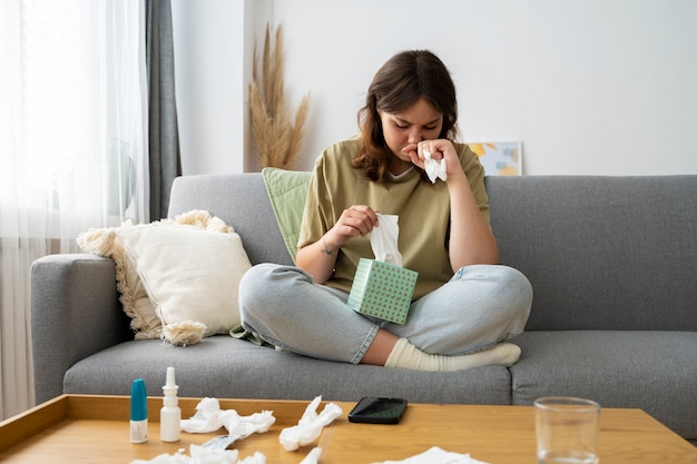 Free Photo front view woman suffering from allergies