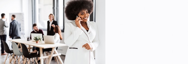 Front view of woman talking at phone