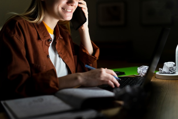 Front view of woman talking at phone