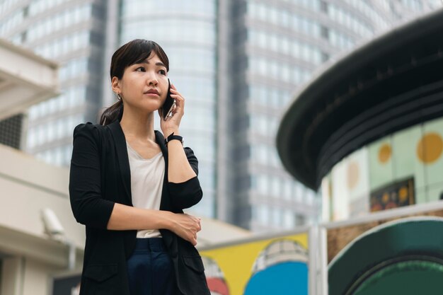 Front view of woman talking on phone