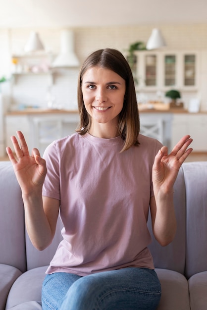 Front view of woman using sign language