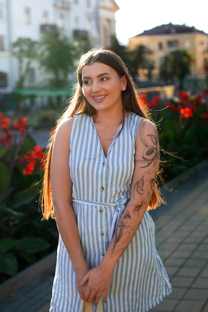 Free Photo front view woman wearing beautiful sundress