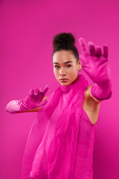 Free photo front view woman wearing full pink outfit