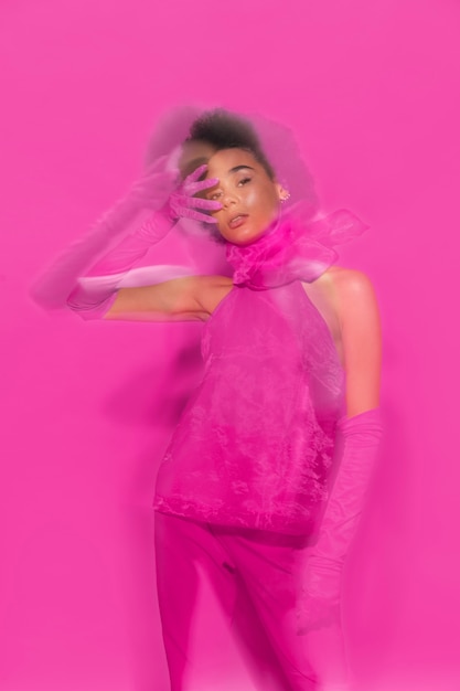 Front view woman wearing full pink outfit