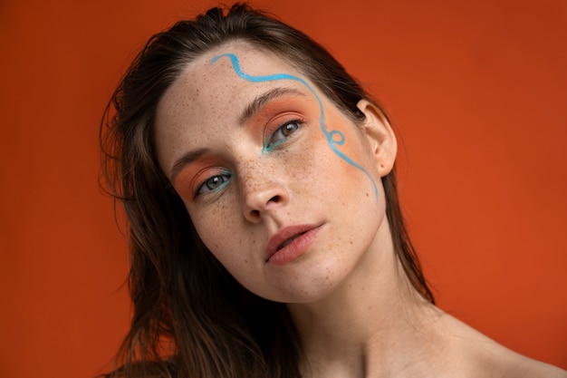 Front view woman wearing  makeup with thick eyebrows