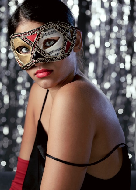 Front  view of woman with elegant carnival mask