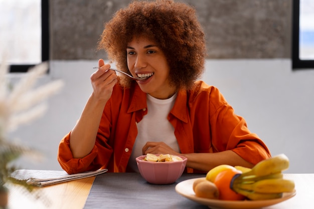 Front view woman with healthy food