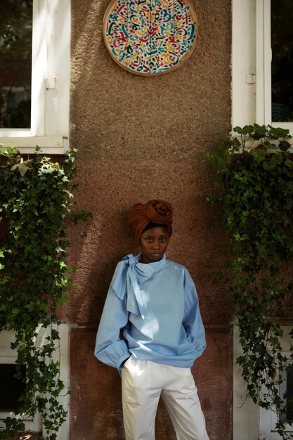 Front view woman with hijab posing