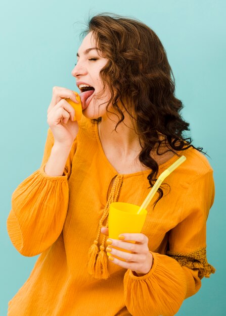 Front view of woman with lemonade