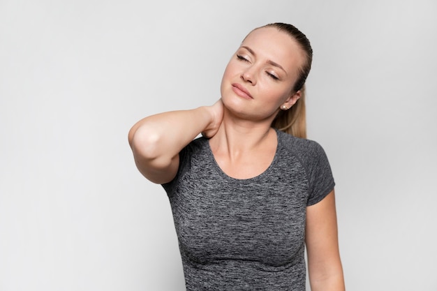 Front view of woman with neck pain