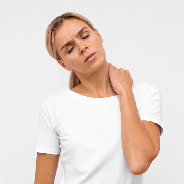 Front view of woman with neck pain