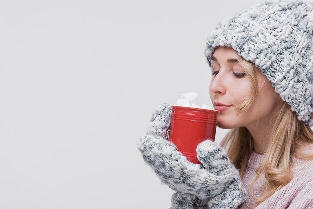 Front view woman with red mug