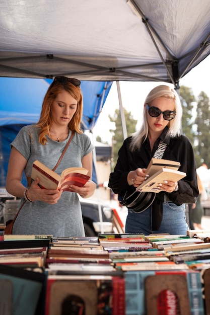 Free Photo front view women looking at books