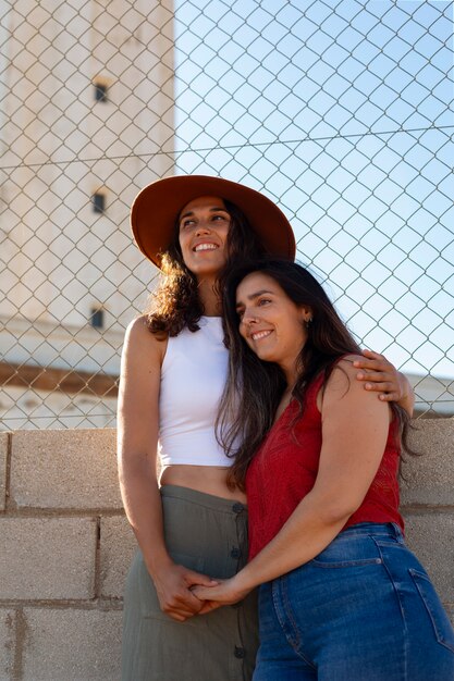 Front view women posing with lighthouse